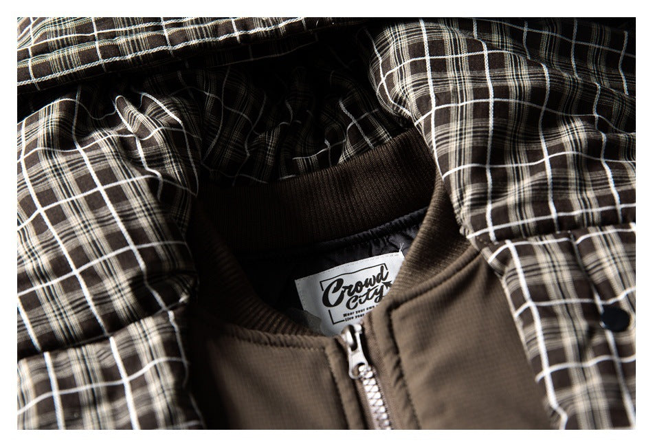 Close-up of the plaid-lined collar, zipper, and sewn-in English brand label.