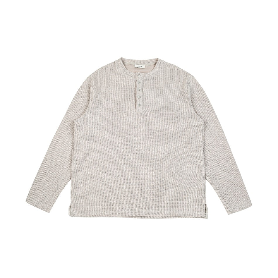 Light gray long-sleeve waffle-knit henley top with five buttons, flat front view