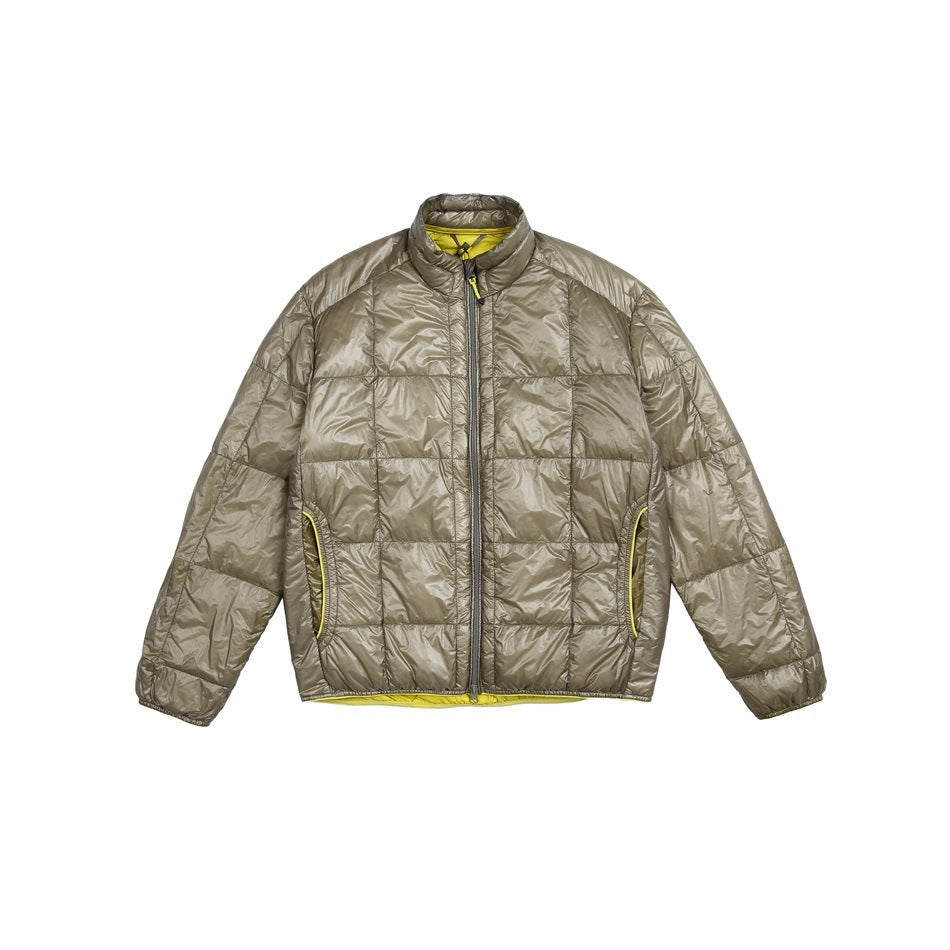 Front view of a taupe-gray quilted jacket with a stand collar, full zip, and yellow trim.