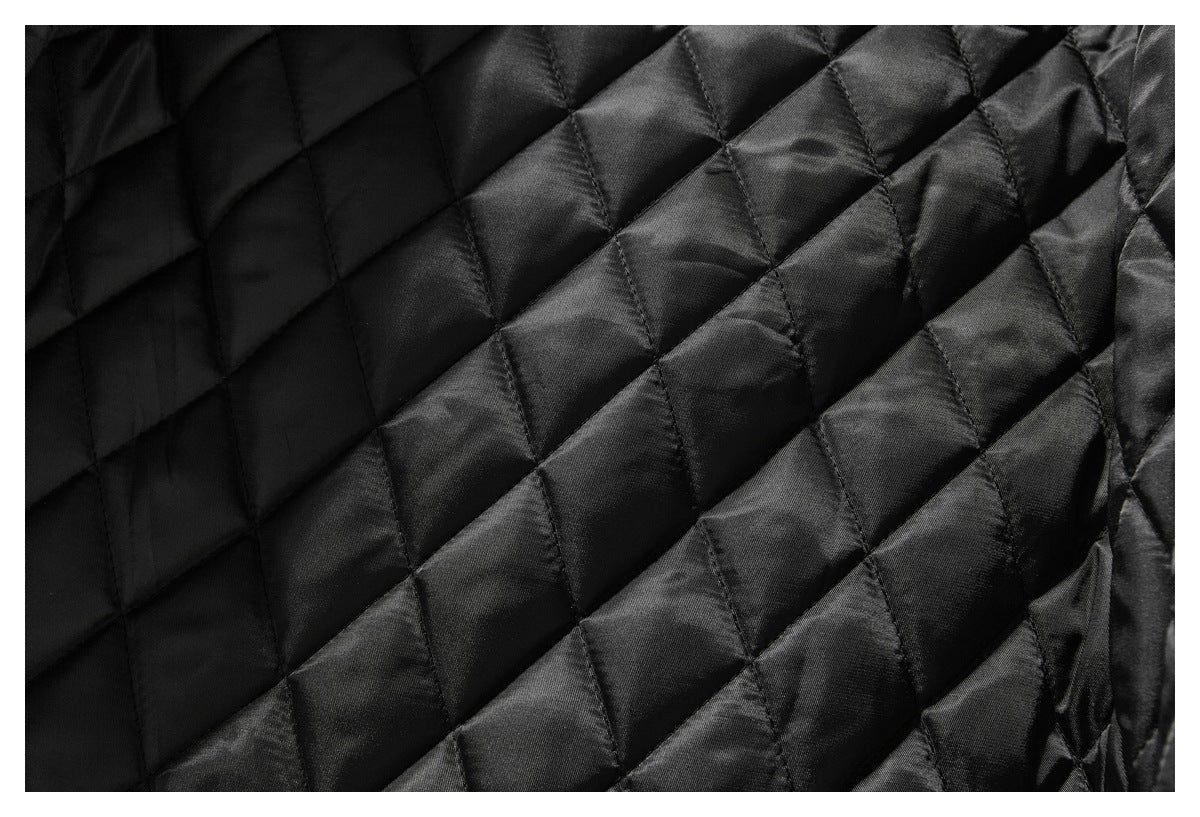 Close-up of the jacket’s black diamond-quilted lining.