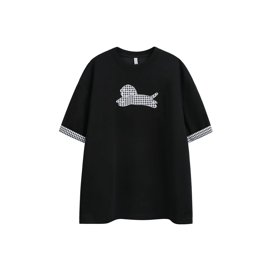 Front view of a black short-sleeve T-shirt with a checked dog graphic on the chest and checked sleeve cuffs.