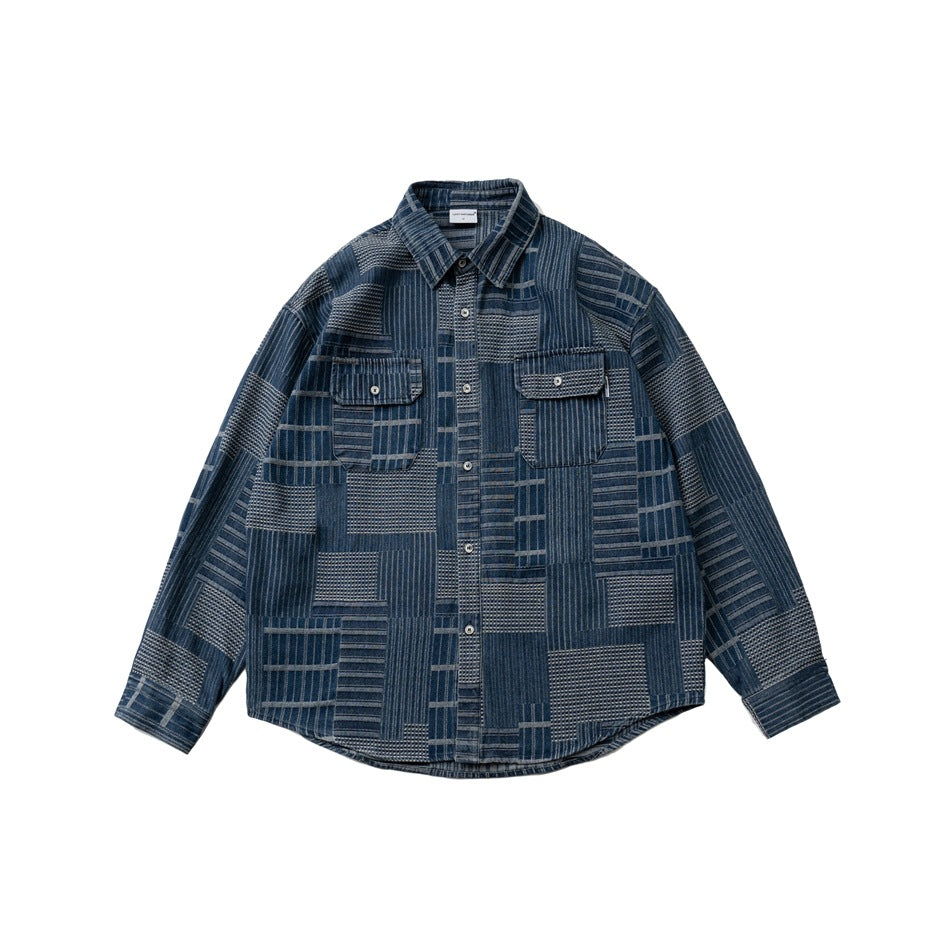 Blue patchwork-pattern long-sleeve button-front shirt with two chest flap pockets, laid flat, front view