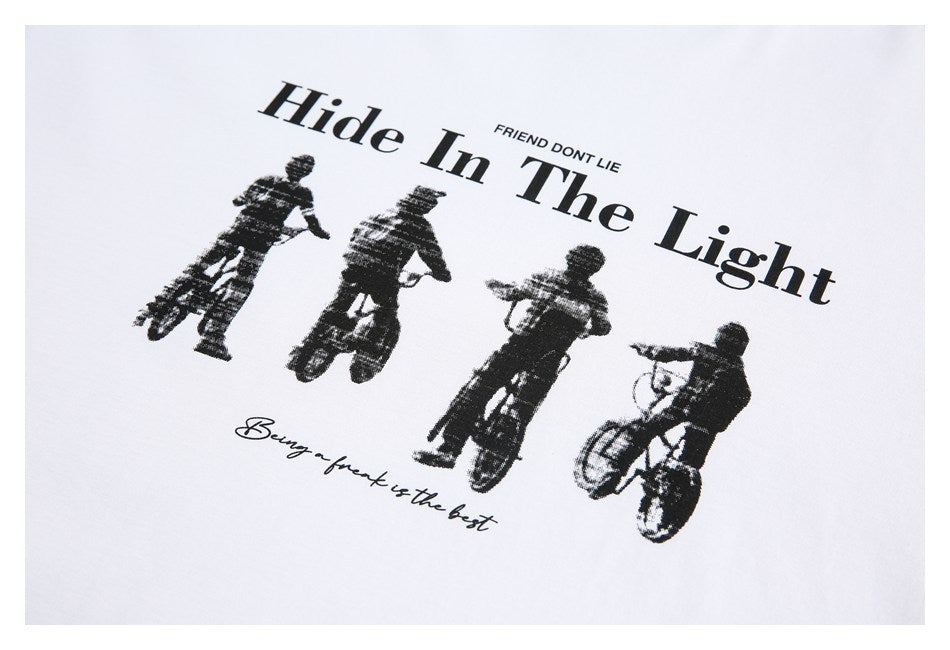 Black cyclist graphic and English lettering printed on white fabric.