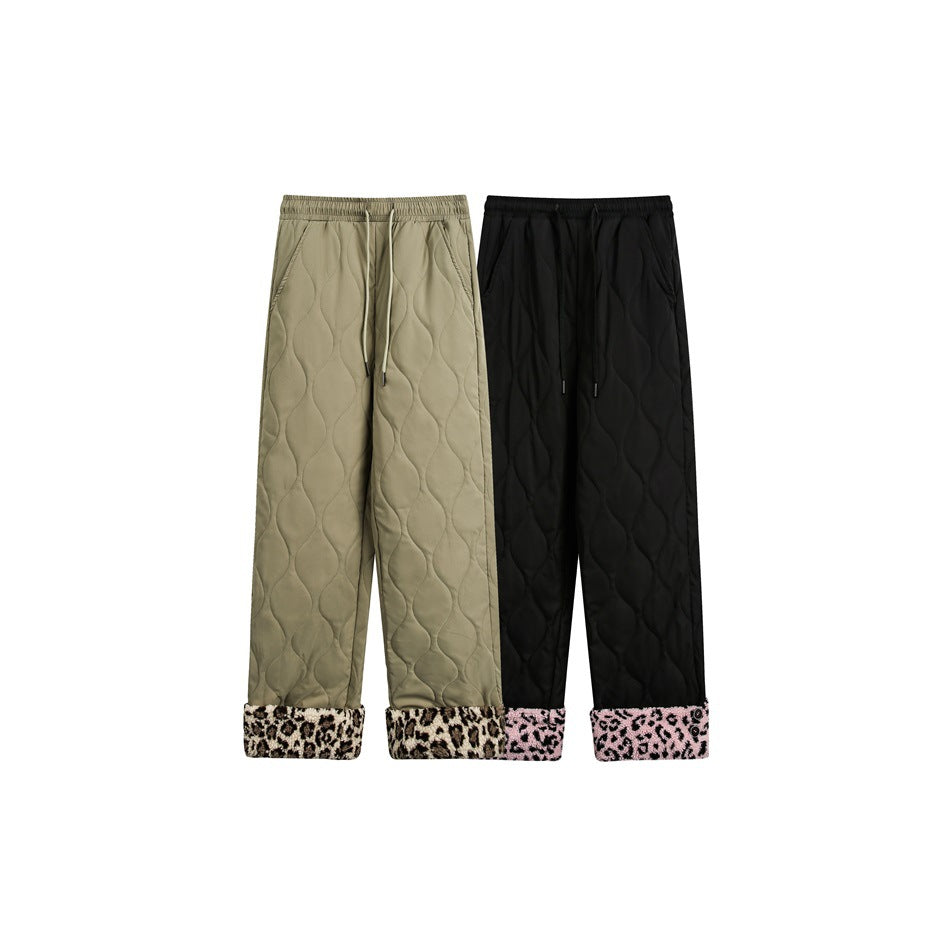 Two quilted wide-leg pants colorways shown together: khaki with brown patterned cuffs and black with pink leopard-print