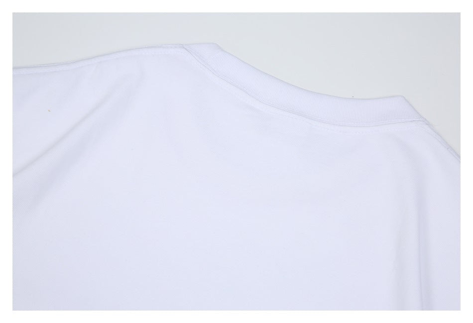 Cropped flat view of the upper back and crew neckline of a plain white shirt.