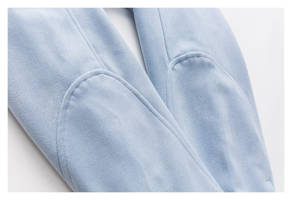 Close-up of pale blue sleeves showing curved stitched elbow panels.