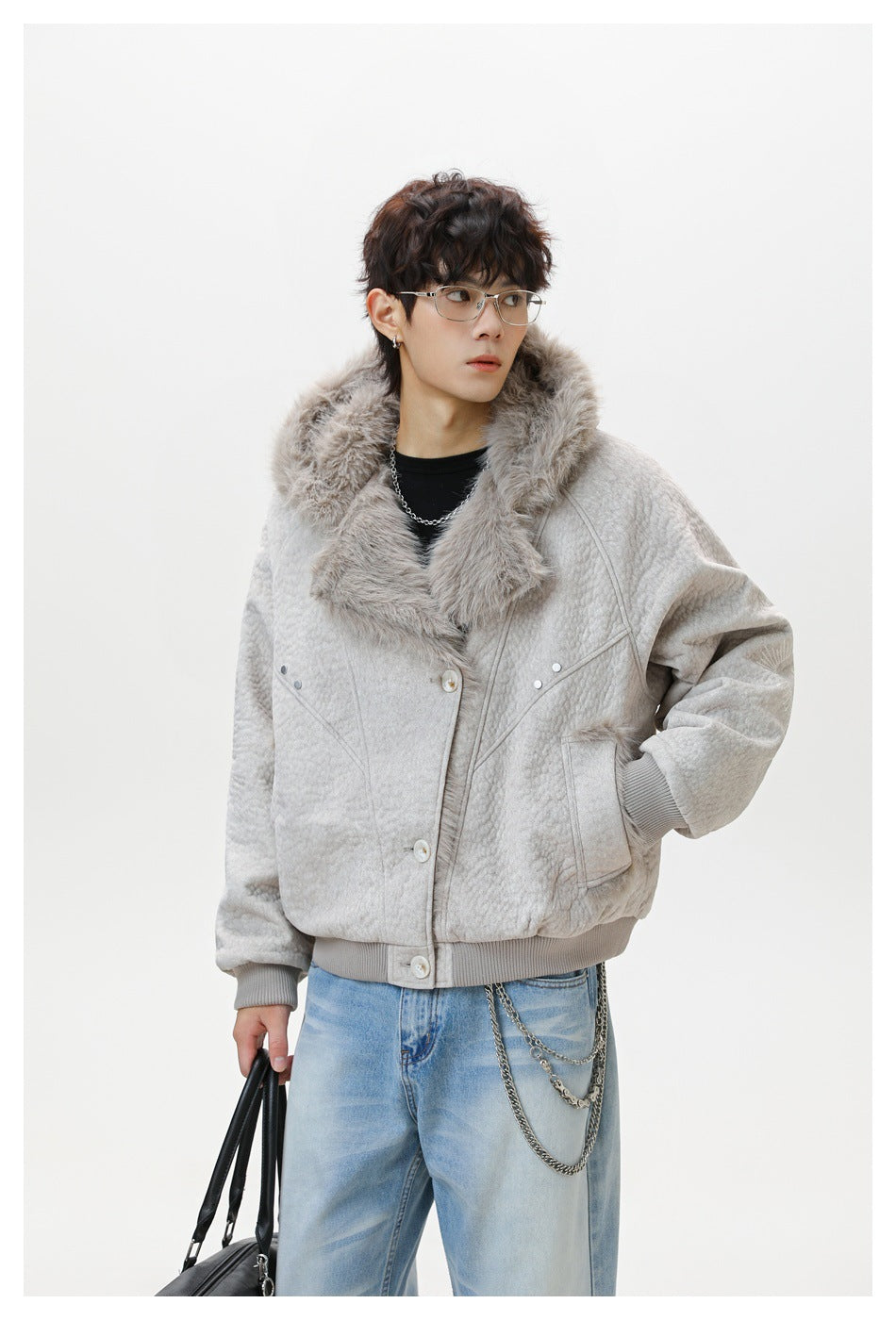 Model wearing a light gray quilted jacket with a plush fur collar, front buttons, and ribbed trim.