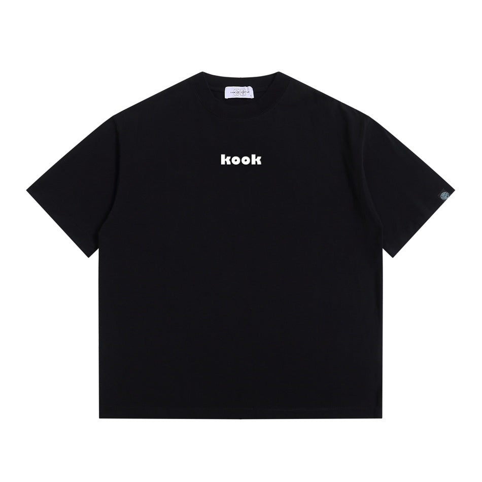 Black short-sleeve crew-neck T-shirt with small white 'kook' print at center chest, flat front view