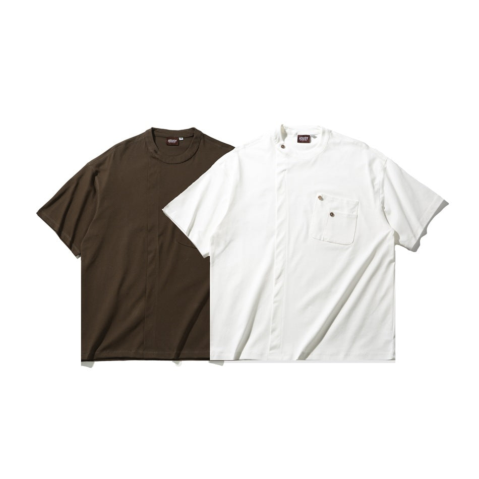 Two short-sleeve shirts shown side by side: one dark brown and one white, each with a chest pocket and asymmetrical placket.