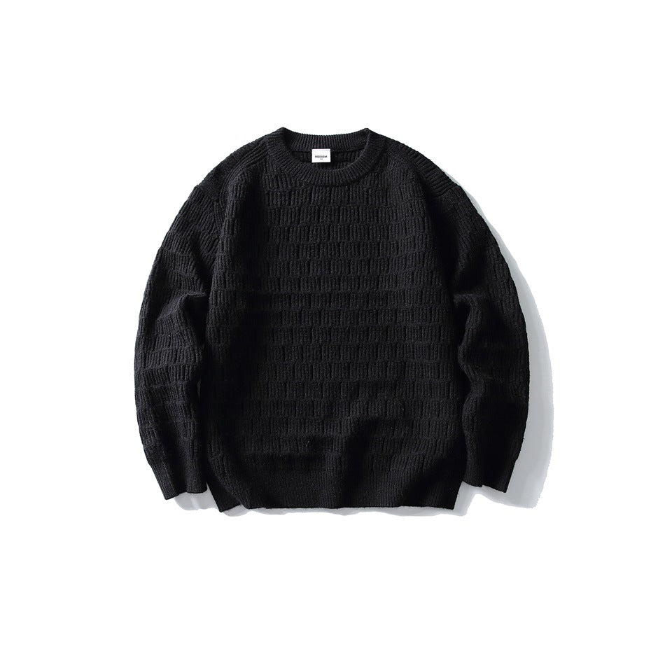 Black crew-neck knit sweater with basket-weave texture, flat lay front view