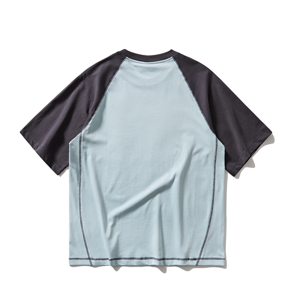 Back view of a pale blue raglan T-shirt with charcoal short sleeves and visible contrast seams.