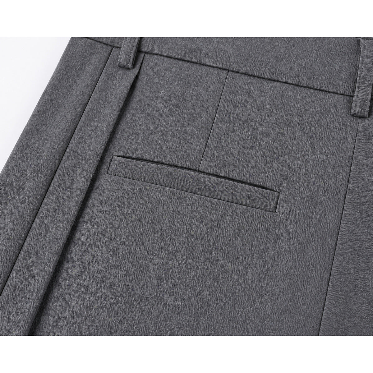 Close-up of gray trousers showing a single welt pocket and belt loops at the back.