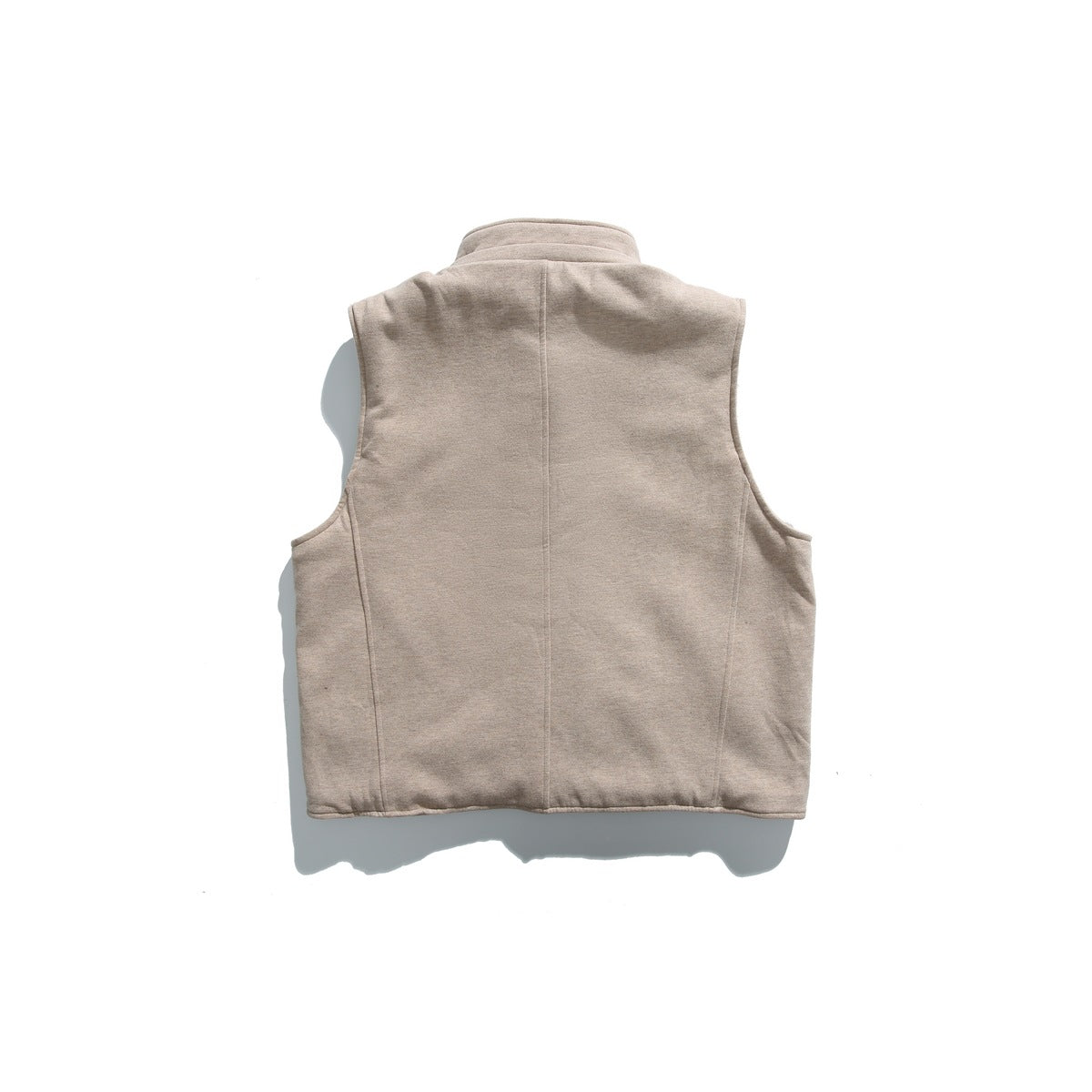 Back view of a light taupe sleeveless vest with a stand collar and vertical panel seams.