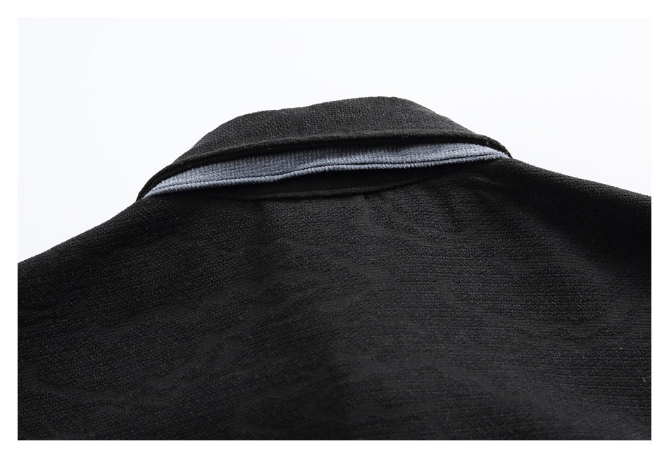 Close-up of the black shirt's back collar with a light gray inner collar detail.
