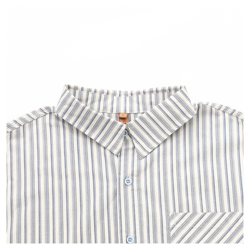 Close-up of the striped shirt's pointed collar, front buttons, and upper chest pocket.