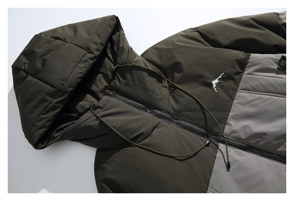 Close-up of the jacket hood, drawcords, front zipper, and small white chest graphic.