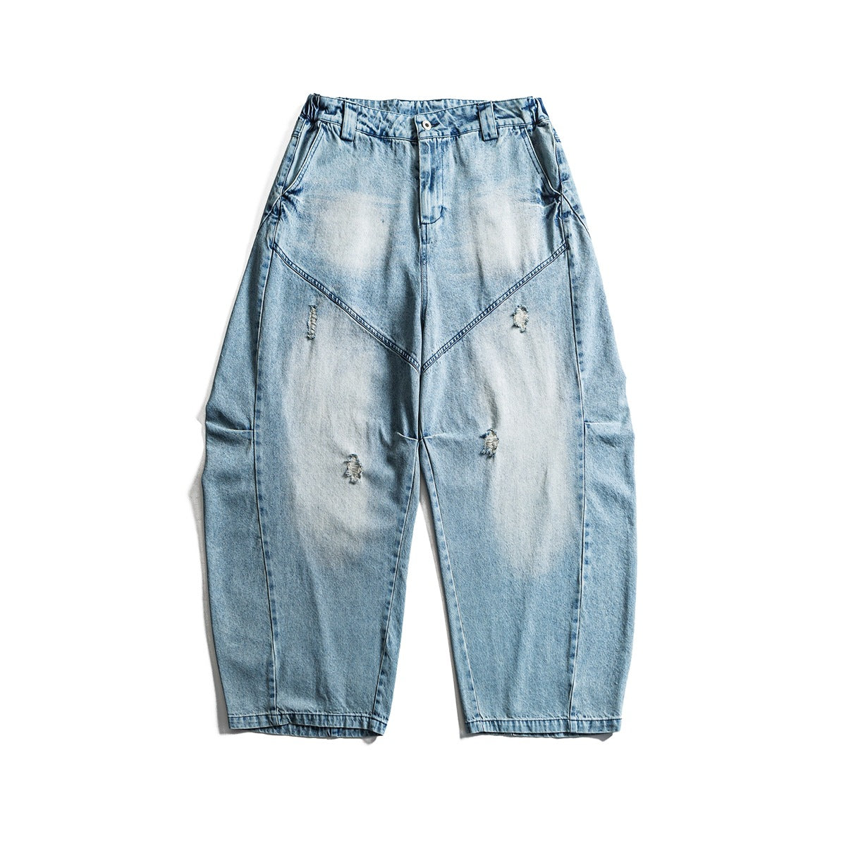 Light blue washed wide-leg jeans flat lay with V-shaped front seams, faded thighs and small rips