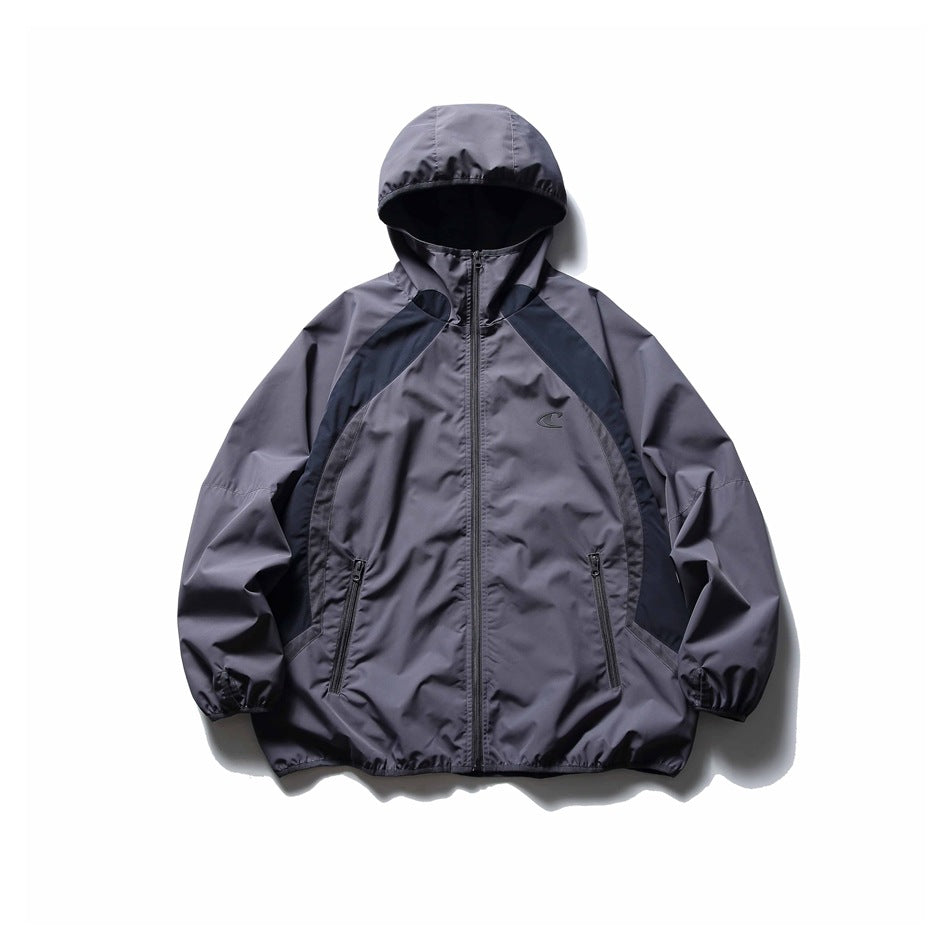 Gray hooded zip jacket with dark navy contrast panels, zippered pockets and elastic cuffs, front flat view