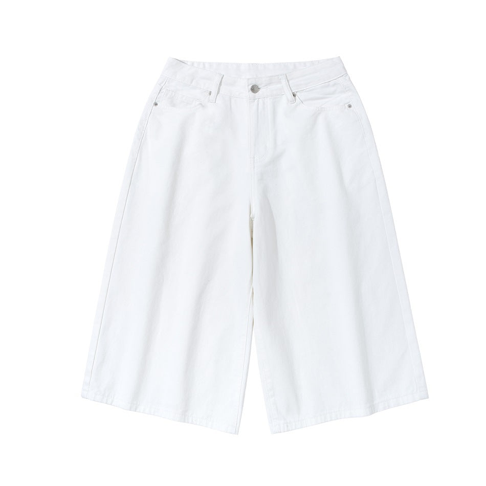 White knee-length wide-leg shorts flat lay, front view with button fly, belt loops and front pockets