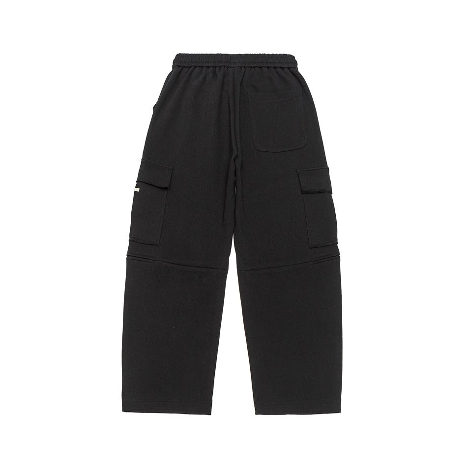 Black wide-leg pants with an elastic waistband, one back pocket, and large flap cargo pockets.
