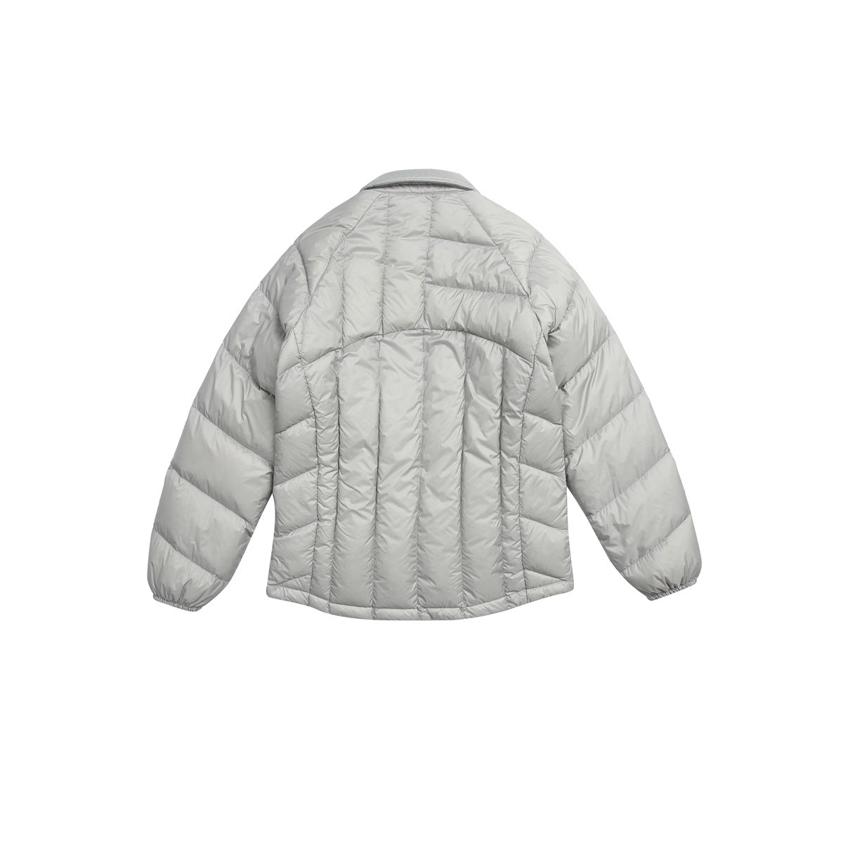 Back view of a light gray quilted jacket with long sleeves and a curved hem, shown on white.