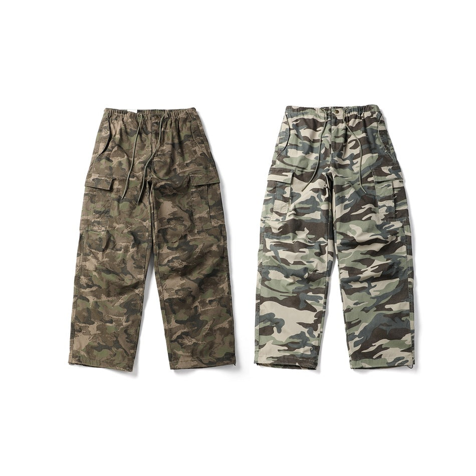 Two pairs of loose cargo pants shown side by side in different camouflage patterns.