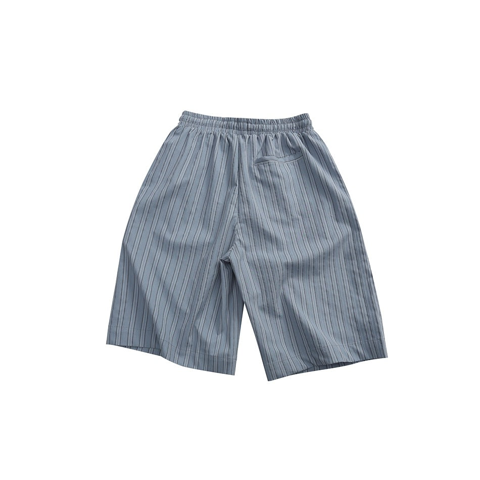 Back view of light blue striped shorts with elastic waistband and a back welt pocket