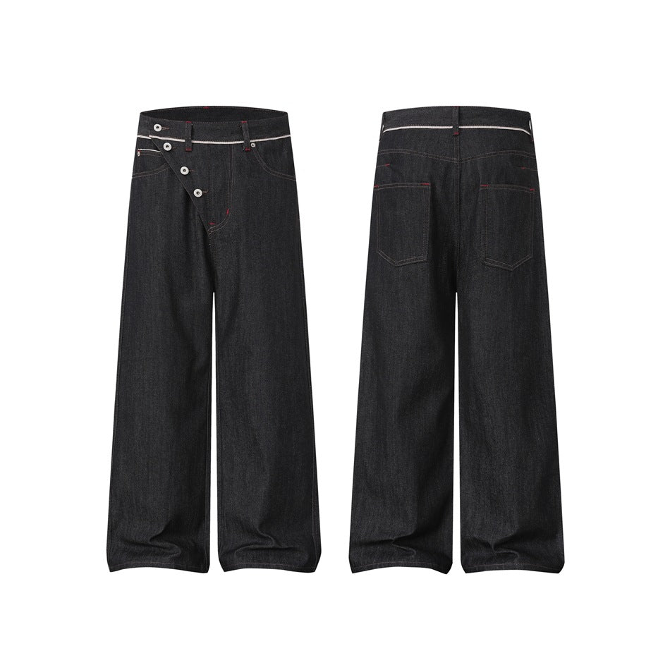 Flat lay showing the front and back of wide-leg black jeans with button fly, contrast stitching and white waistband trim.