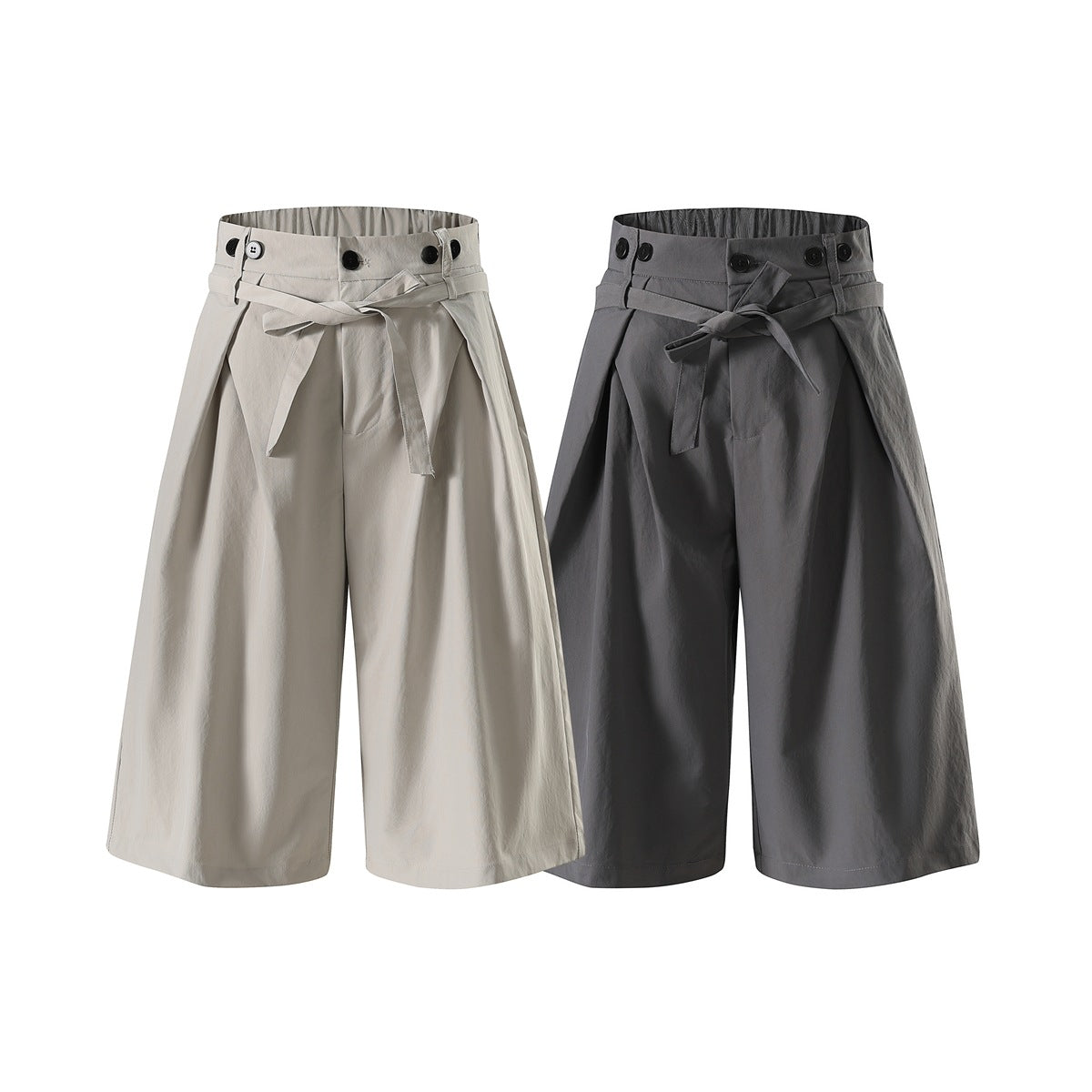 Front view of wide-leg cropped trousers in light beige and charcoal gray, with high gathered waists, buttons and tie belts.