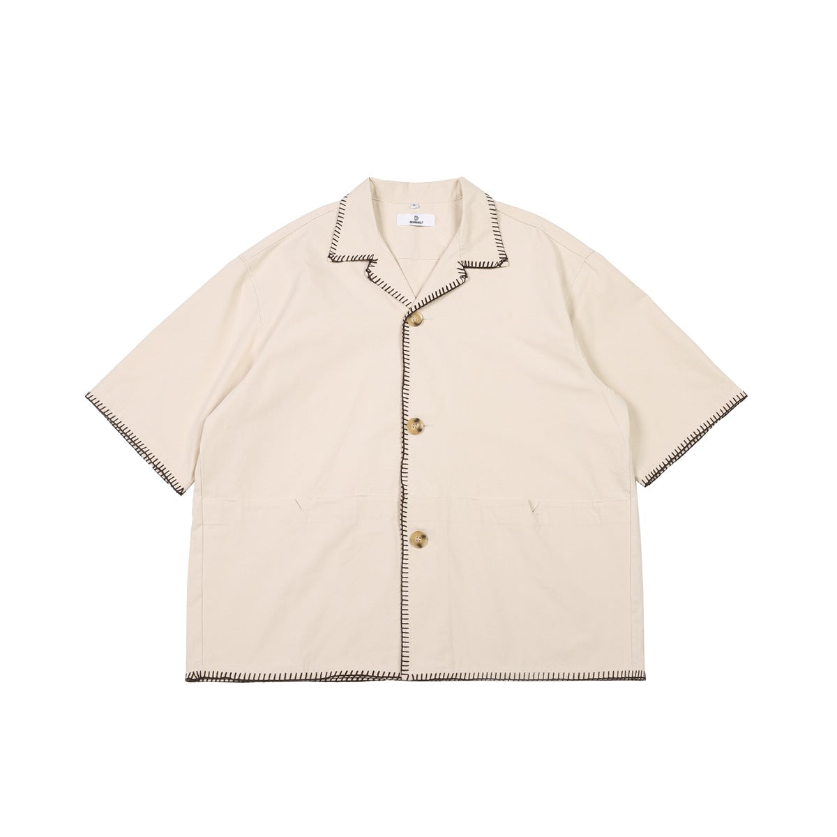 Beige short-sleeve camp-collar shirt with dark brown whipstitch edging and three buttons, flat front view