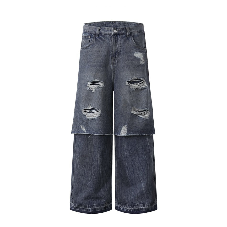 Dark blue wide-leg layered jeans with ripped overlay panel and frayed hem, front flat view