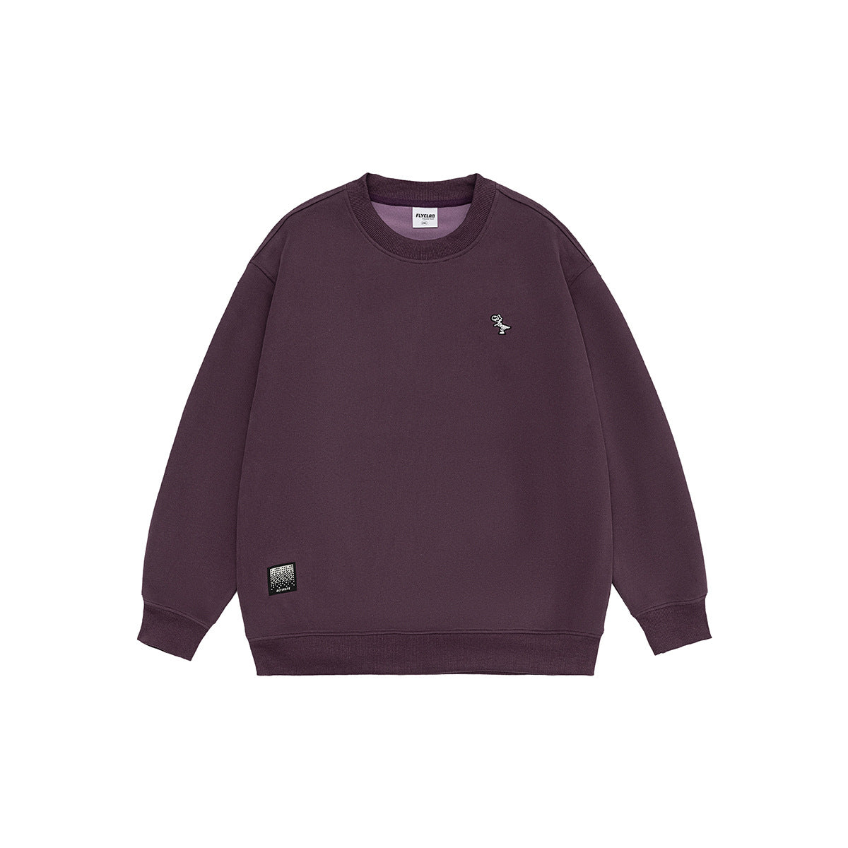 Purple crew-neck sweatshirt flat lay with small embroidered dinosaur on the chest and a label patch at the lower hem
