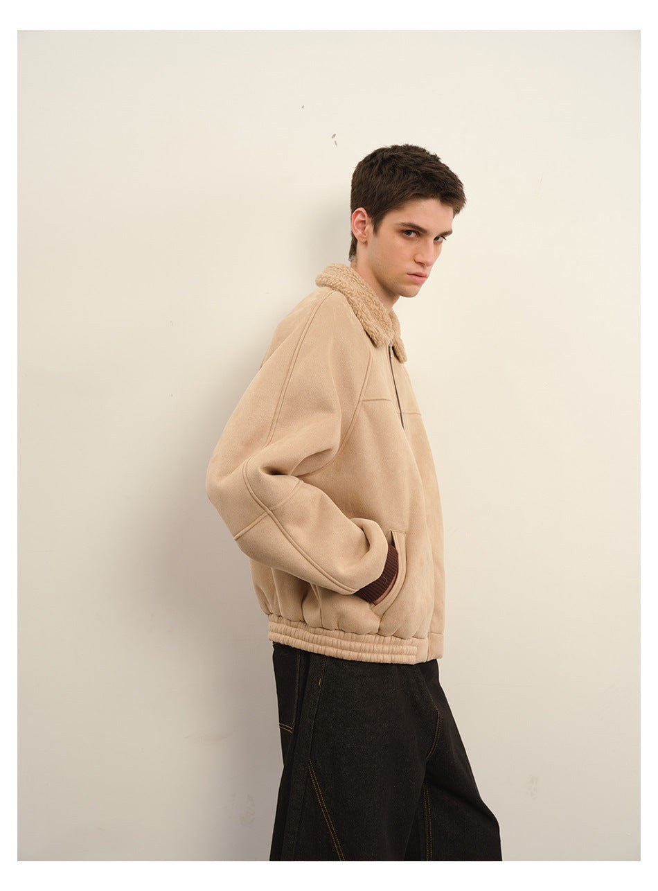 Side view of a model wearing a light beige jacket with a plush collar and ribbed hem.