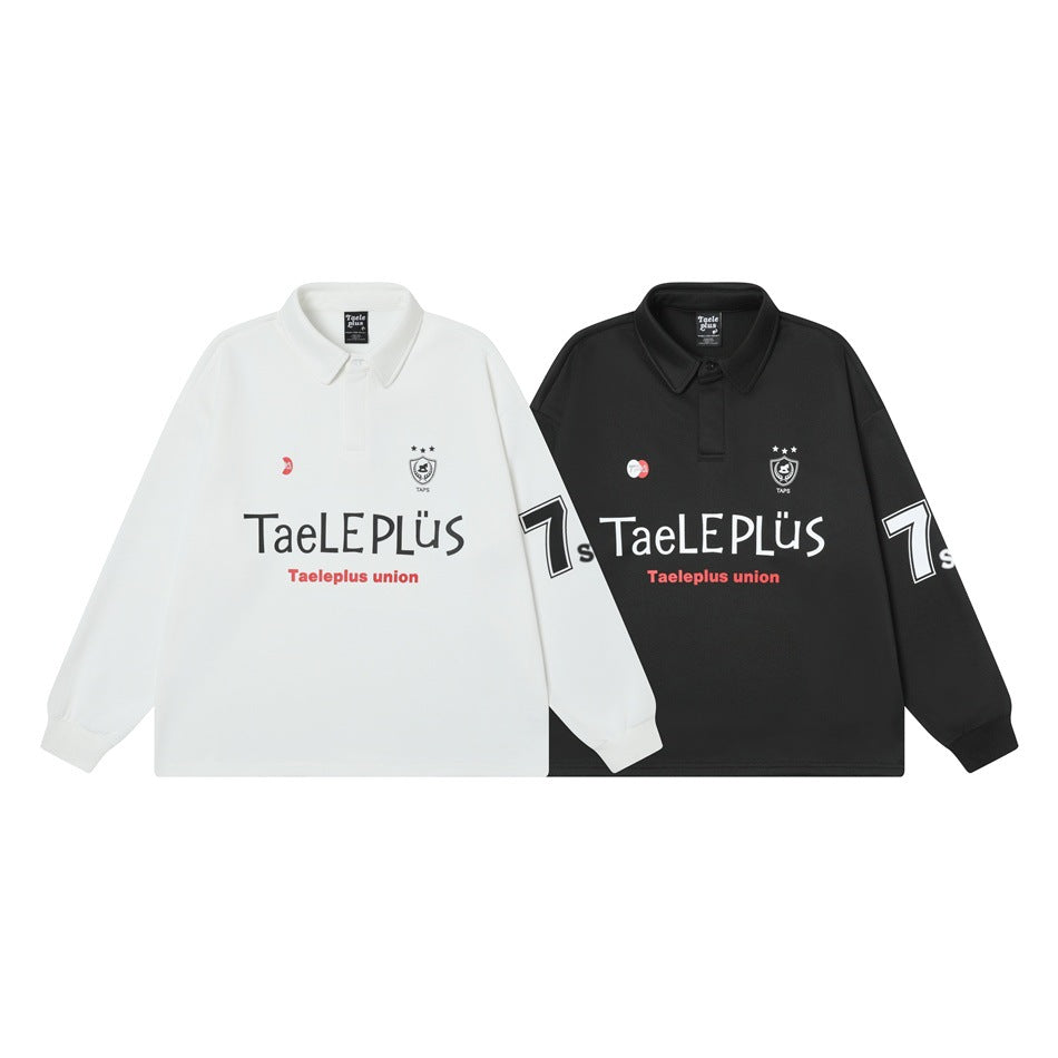 White and black long-sleeve collared polos shown side by side, each with chest graphics and sleeve lettering.