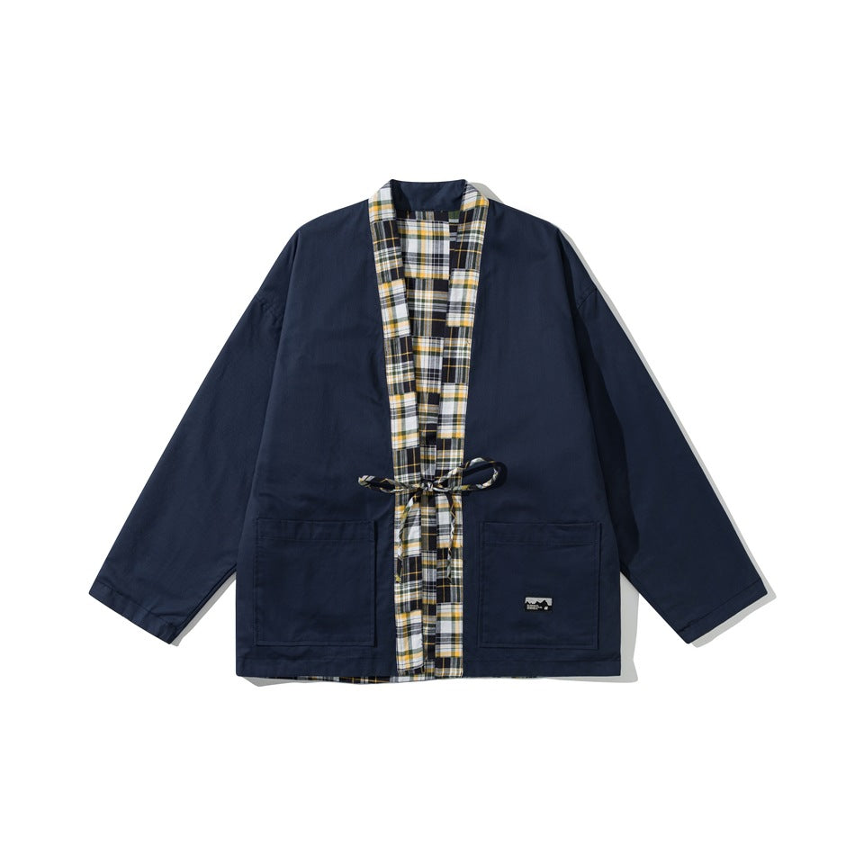 Navy kimono-style jacket with yellow and black plaid front facing, waist tie and two large patch pockets
