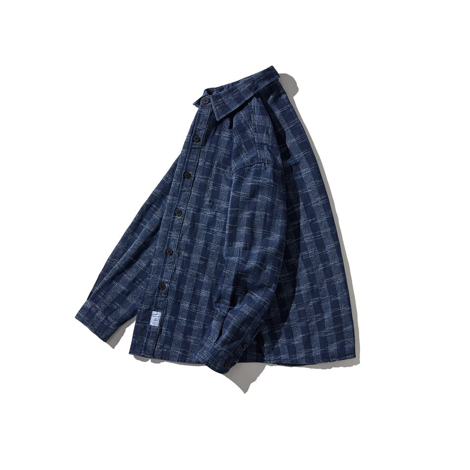 Blue plaid long-sleeve button-up shirt shown at an angle on a white background.