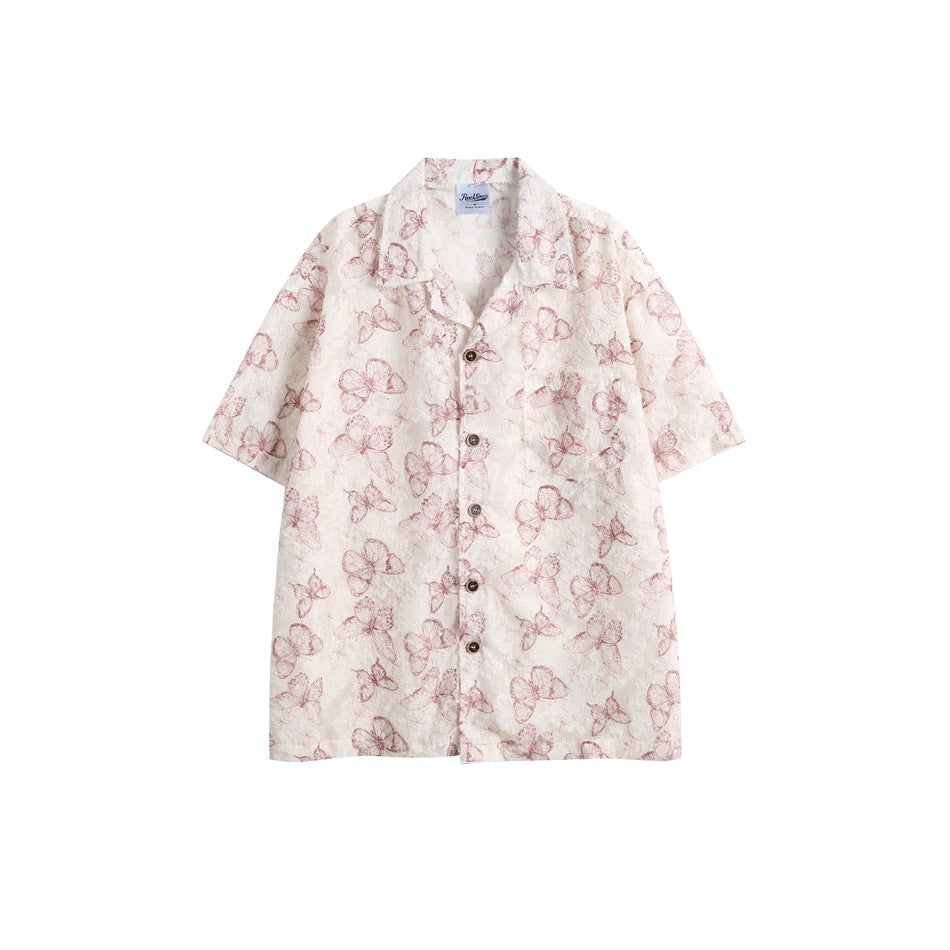 Pink butterfly-print short-sleeve button-up shirt with collar and chest pocket, flat front view