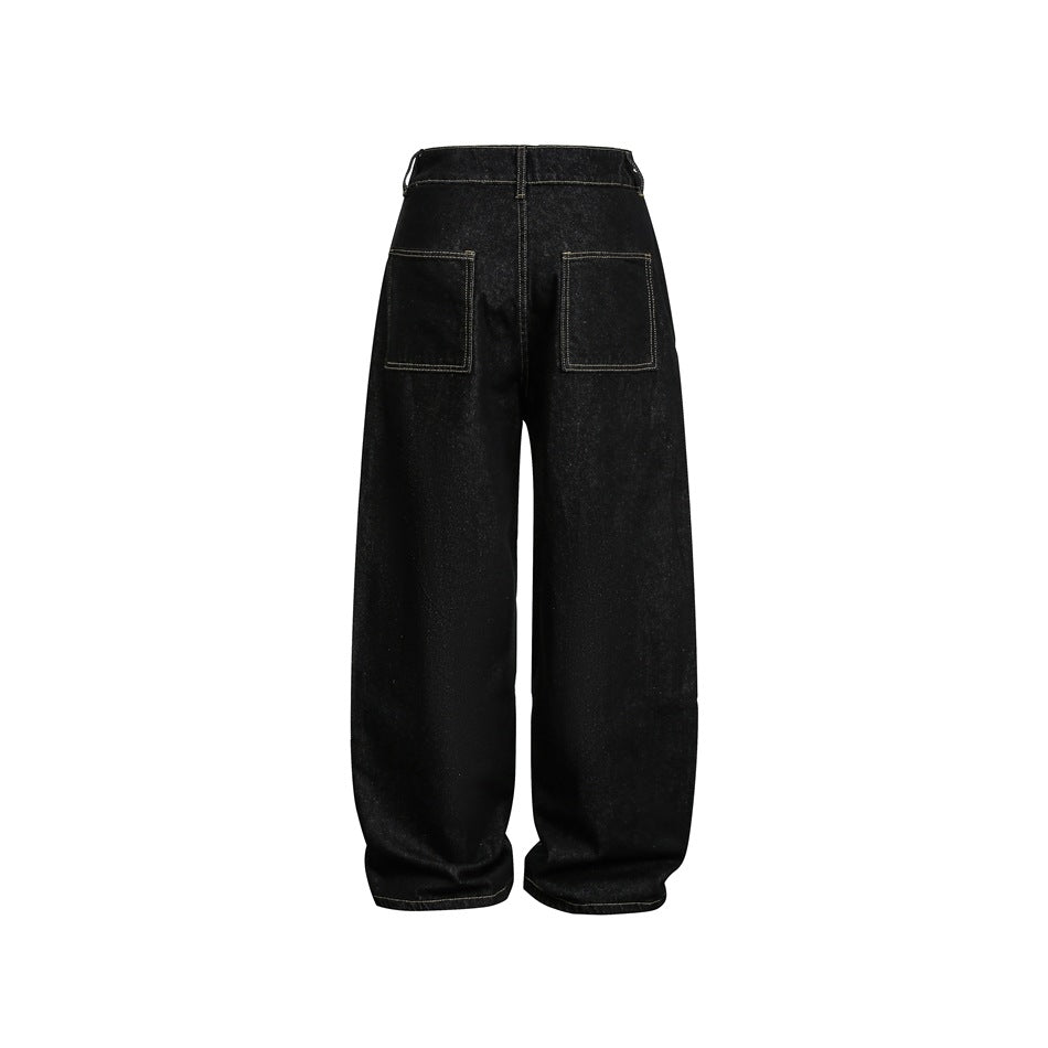Back view of black wide-leg jeans with contrasting gold stitching and two square patch pockets.