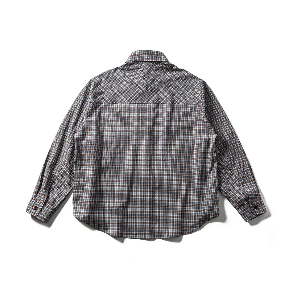 Flat lay back of a plaid long-sleeve shirt with a diagonal-plaid yoke and maroon cuff buttons