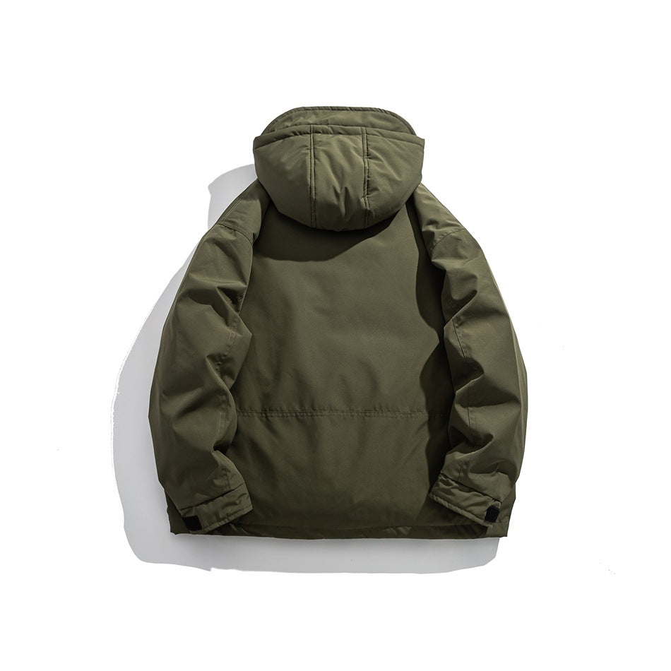 Back view of an olive green hooded jacket laid flat, with a horizontal seam across the lower back.