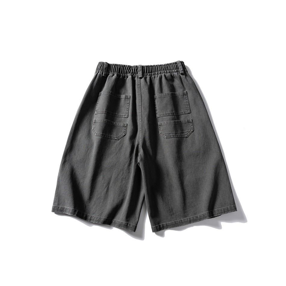 Gray knee-length shorts flat lay back view with elastic waistband and two stacked patch pockets on each side