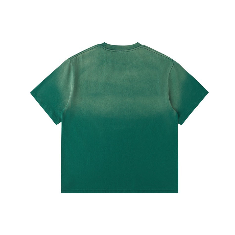 Back view of a plain green short-sleeve crew-neck T-shirt laid flat on a white background.