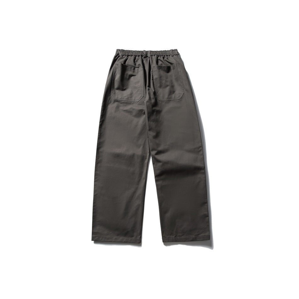 Dark gray wide-leg pants back view with elastic waistband and two patch pockets