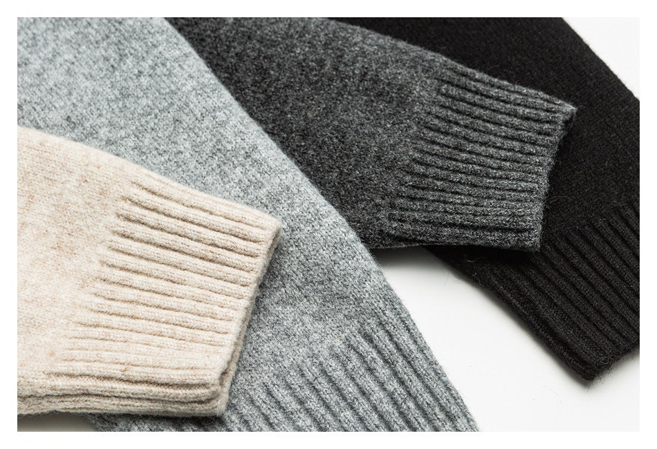 Close-up of ribbed sweater cuffs in beige, gray, charcoal, and black colorways.
