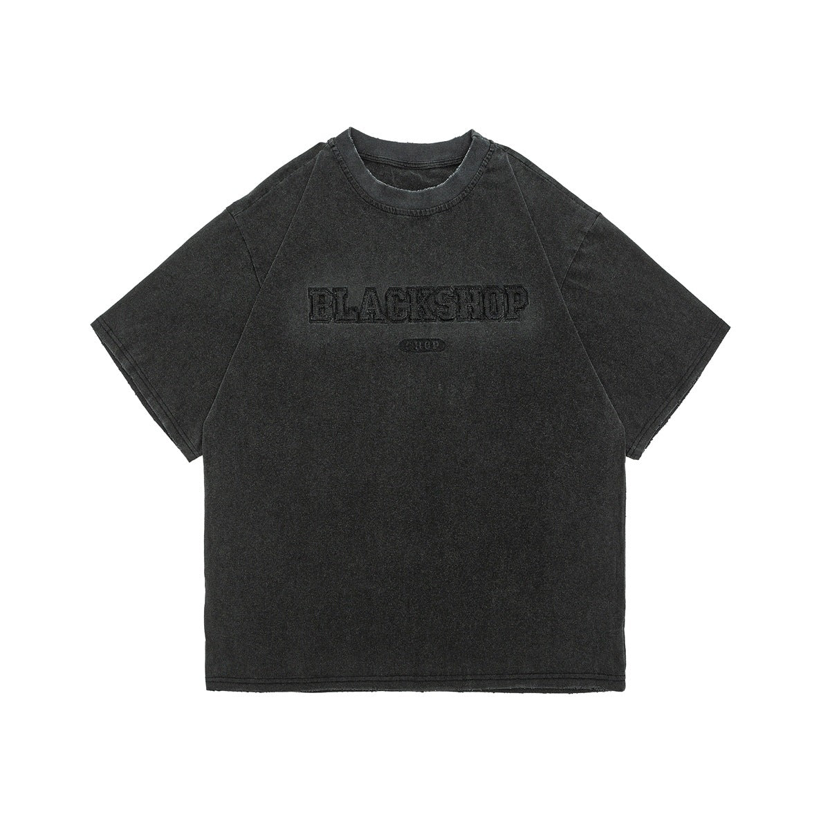 Washed black short-sleeve crewneck T-shirt with tonal BLACKSHOP varsity-letter graphic and frayed edges, flat front view