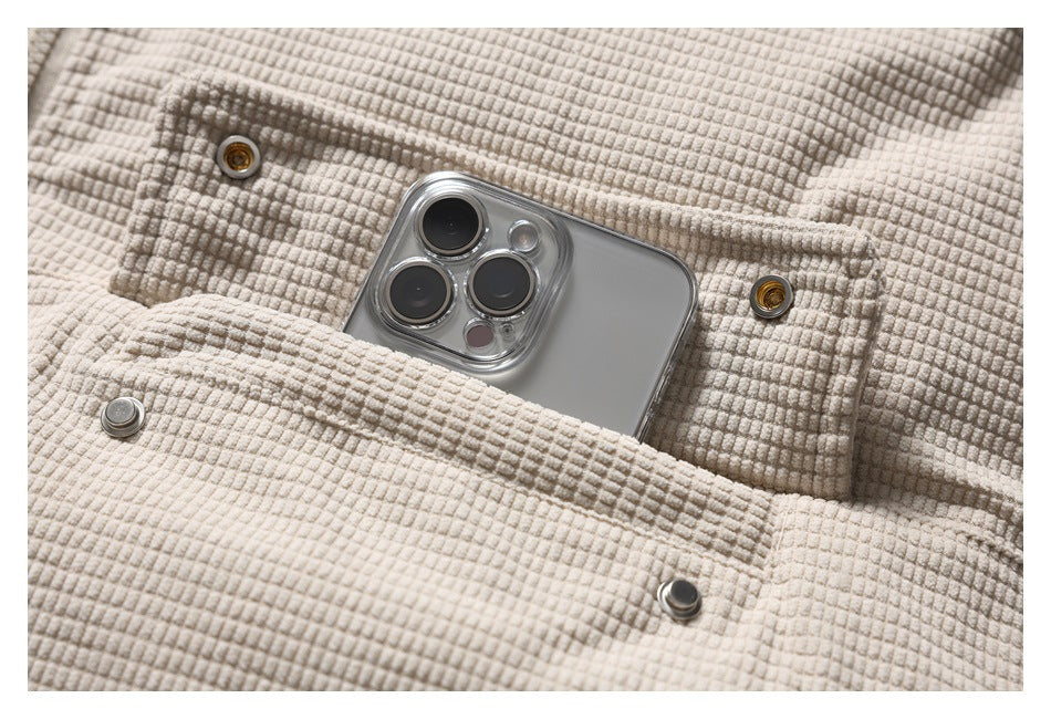 Close-up showing the jacket's snap-button pocket holding a smartphone.