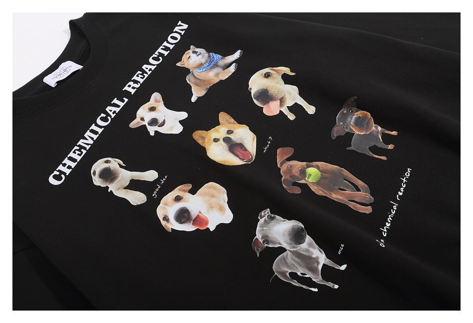 Black crewneck sweatshirt with white “CHEMICAL REACTION” lettering and a collage of playful dog prints.