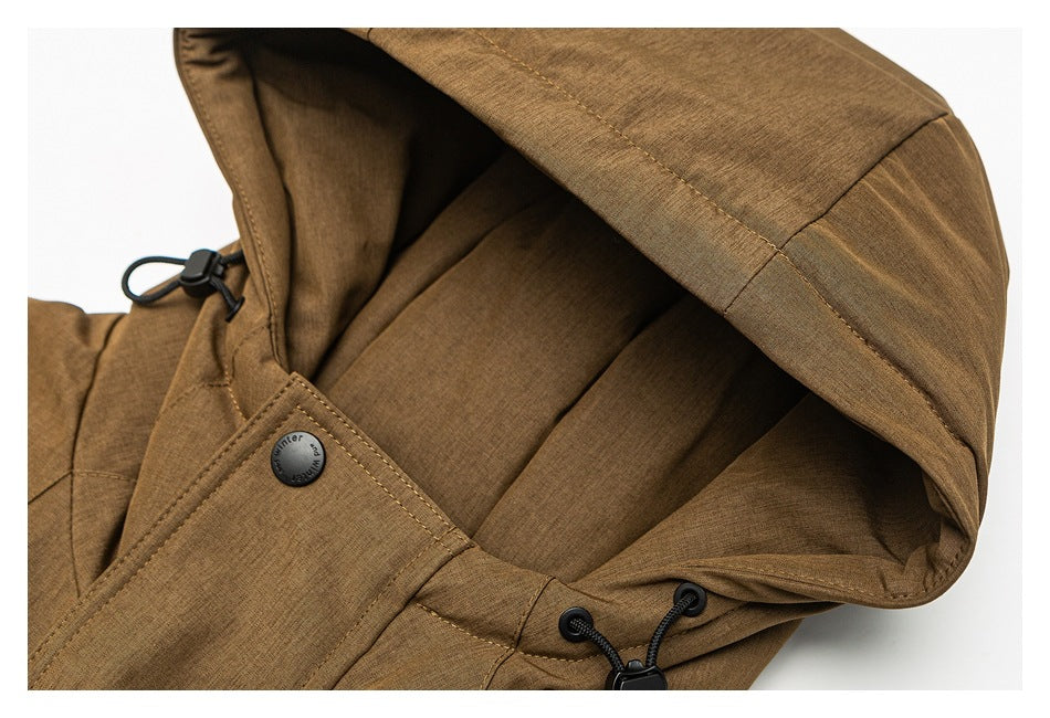 Close-up of the brown jacket's hood, showing its lining, snap, and black drawcord hardware.