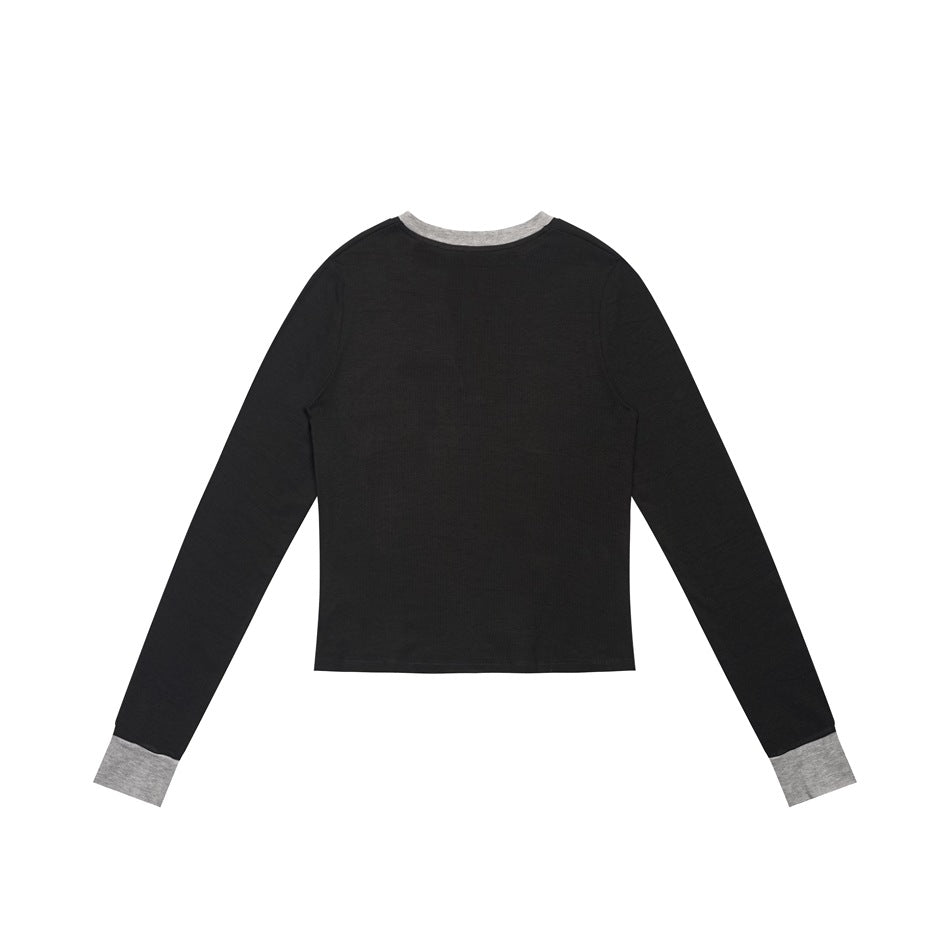 Back view of a black long-sleeve top with heather-gray collar trim and cuffs.