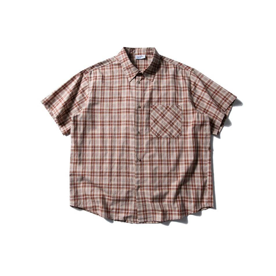 Red and beige plaid short-sleeve button-up shirt, flat lay front view with chest pocket